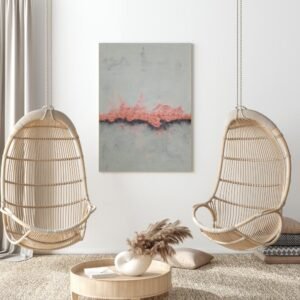 Abstract grey and copper canvas wall art hanging between two rattan swing chairs in a light, modern boho living space.